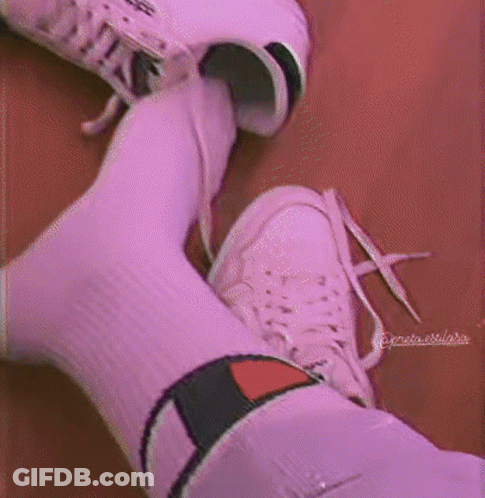 A Person Wearing Purple Socks And White Sneakers GIF