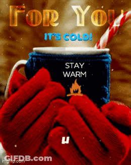 A Person Wearing Red Mittens Is Holding A Cup Of Hot Chocolate That Says " For You It 'S Cold " GIF