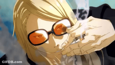A Person Wearing Sunglasses Smoking A Cigarette GIF