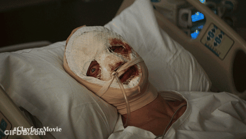 A Person With A Bandage On Their Face Is Laying In A Hospital Bed With The Hashtag #Clayfacemovie GIF