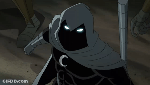 A Person With A Hood And A Crescent Moon On Their Chest GIF