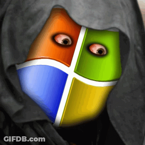 A Person With A Hood On Their Head Has A Microsoft Logo On Their Face GIF
