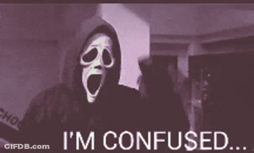 A Person With A Mask On Their Face And The Words I 'M Confused . GIF