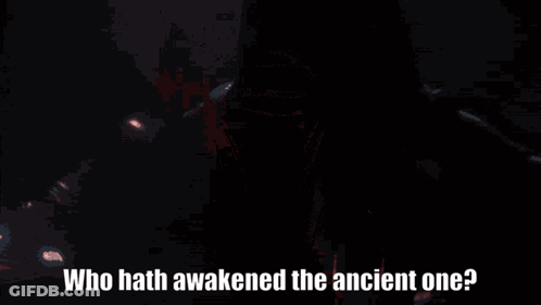 A Person With A Red Light Behind Them And The Words " Who Hath Awakened The Ancient One " GIF