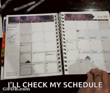 A Person With A Ring On Their Finger Is Checking Their Schedule GIF
