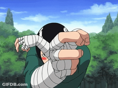 A Person With Bandages On Their Hands Is Covering Their Face With Trees In The Background GIF