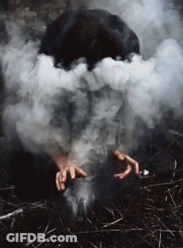 A Person With Smoke Coming Out Of Their Head GIF
