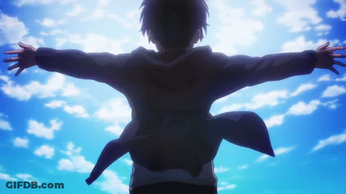 A Person With Their Arms Outstretched Looking Up At The Sky GIF