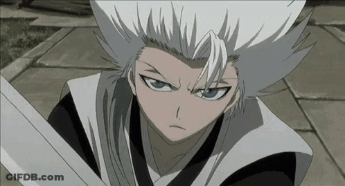 A Person With White Hair And Blue Eyes Is Holding A Sword GIF