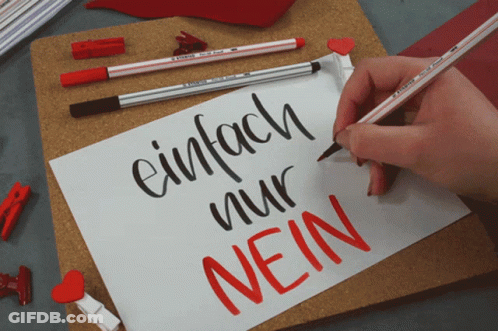 A Person Writing On A Piece Of Paper That Says Einfach Nur Nein GIF