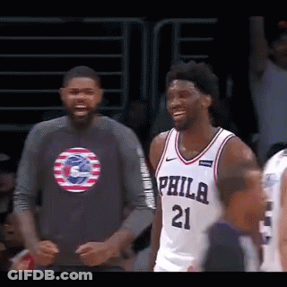 A Philadelphia Basketball Player Wearing A Jersey With The Number 21 On It GIF