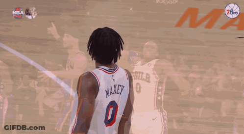 A Philadelphia Basketball Player Wearing Number 0 Celebrates GIF