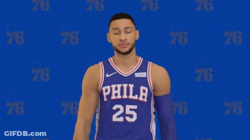 A Philadelphia Basketball Player Wearing Number 25 Poses For A Photo GIF