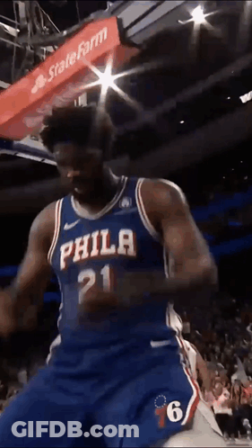 A Philadelphia Basketball Player With The Number 21 On His Shirt GIF