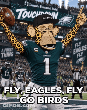 A Philadelphia Eagles Mascot Is Holding A Football In His Hands GIF