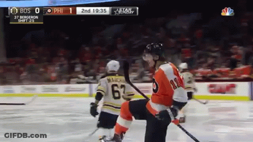 A Philadelphia Flyers Hockey Player Kneeling On The Ice During A Game GIF