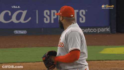 A Philadelphia Phillies Baseball Player Stands On The Field During A Game GIF