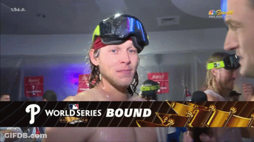 A Philadelphia Phillies Player Is Covered In Beer During A World Series Bound Celebration GIF