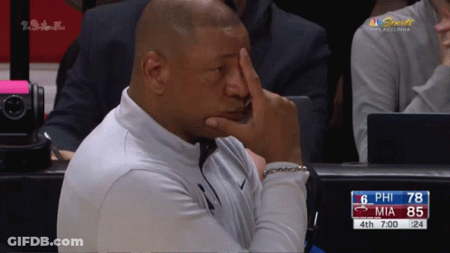 A Philadelphia Sports Broadcast Shows A Man Covering His Face GIF