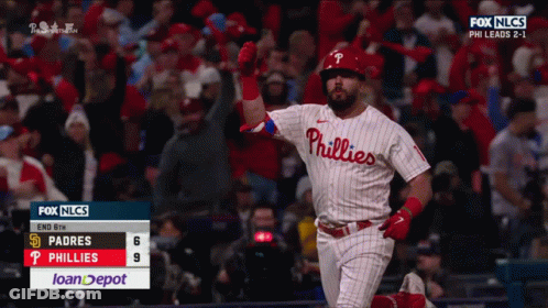 A Phillies Baseball Player Celebrates His Home Run During A Game GIF