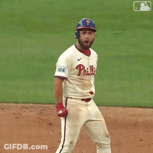 A Phillies Baseball Player Says Let 'S Go While Standing On The Field GIF