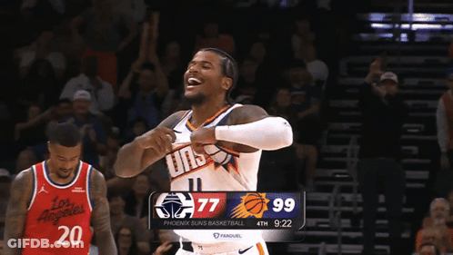 A Phoenix Suns Basketball Player Laughs During The 4Th Quarter Of A Game GIF
