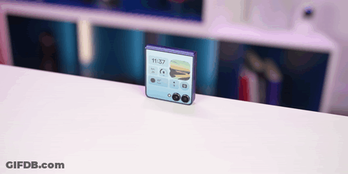 A Phone Displays The Time As 11:37 On The Screen GIF