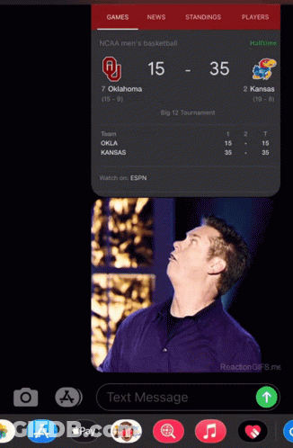 A Phone Screen Shows A Basketball Game Between Oklahoma And Kansas With The Score 15-35 GIF