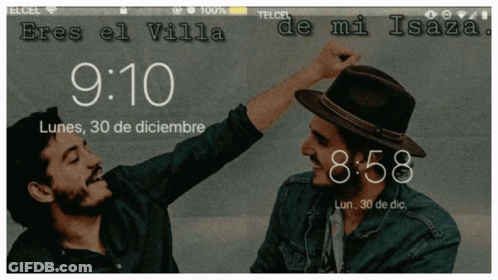 A Phone Screen Shows Two Men Laughing And Says Eres El Villa De Mi Isaza GIF