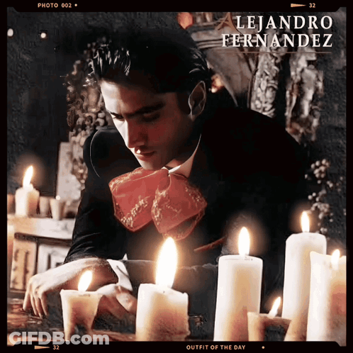 A Photo Of A Man Surrounded By Candles With The Name Leandro Fernandez On The Bottom GIF