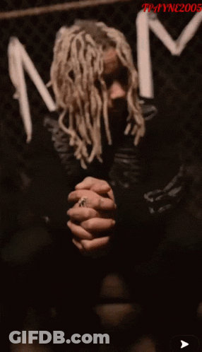 A Photo Of A Man With Dreadlocks Has The Year 2005 On The Bottom GIF