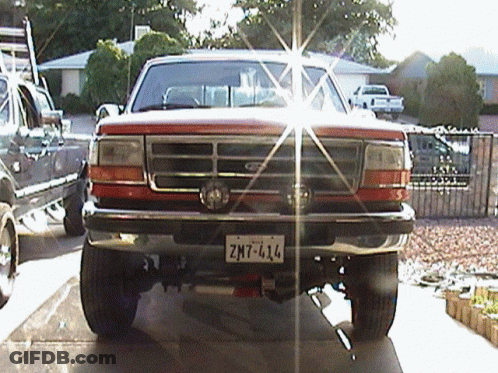 A Pickup Truck With A License Plate That Says Zmt-414 GIF