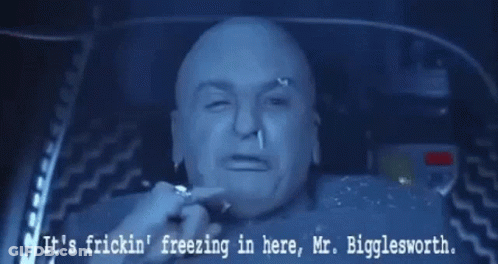 A Picture Of A Bald Man With The Words " It 'S Fricking Freezing In Here Mr. Bigglesworth " GIF