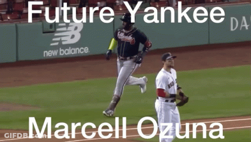 A Picture Of A Baseball Game With The Name Marcel Ozuna On The Bottom GIF