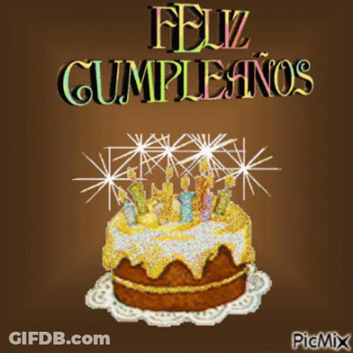 A Picture Of A Birthday Cake With Candles And The Words Feliz Cumpleanos GIF