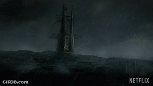 A Picture Of A Boat In The Ocean With A Netflix Logo In The Corner GIF
