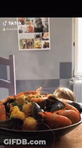 A Picture Of A Bowl Of Food With The Hashtag Tiktok On The Bottom GIF