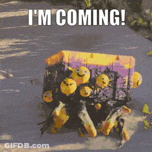 A Picture Of A Box With Smiley Faces On It And The Words " I 'M Coming " GIF