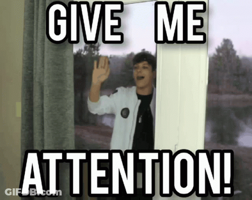 A Picture Of A Boy Standing In A Doorway With The Words Give Me Attention Below Him GIF