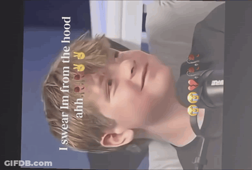 A Picture Of A Boy With The Words " I Swear I 'M From The Hood " On The Bottom GIF