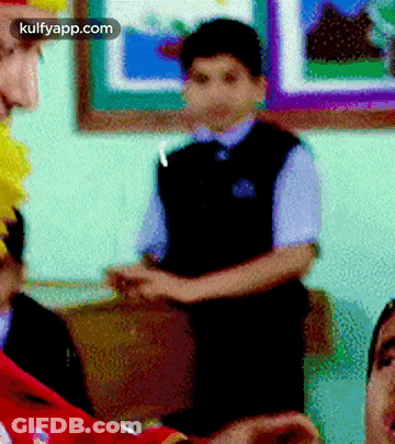 A Picture Of A Boy With The Words Kulfyapp.com On It GIF