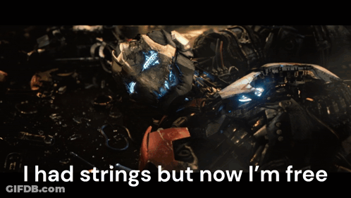 A Picture Of A Broken Robot With The Words I Had Strings But Now I 'M Free GIF