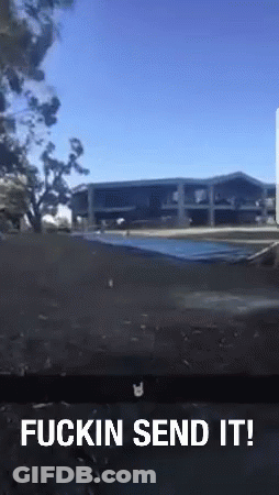 A Picture Of A Building With The Words " Fuckin Send It " At The Bottom GIF