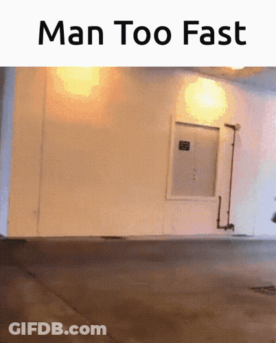 A Picture Of A Building With The Words Man Too Fast GIF