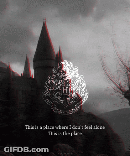 A Picture Of A Castle With A Crest That Says Hogwarts On It GIF