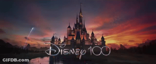 A Picture Of A Castle With The Words Disney 100 On It GIF
