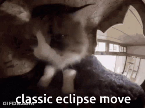 A Picture Of A Cat With The Words Classic Eclipse Move On The Bottom GIF