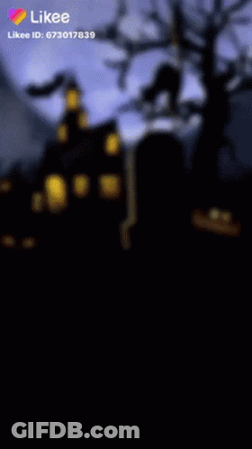 A Picture Of A Cemetery With A Haunted House In The Background And A Likee Icon GIF