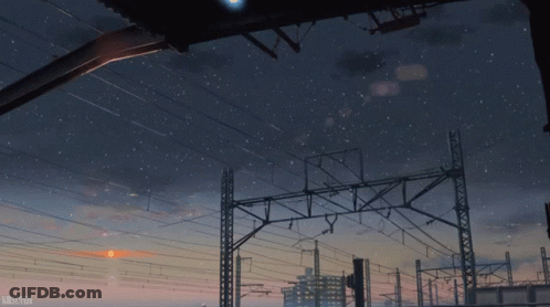 A Picture Of A City At Night With A Starry Sky And A Watermark That Says Mikuton GIF