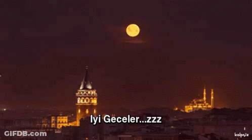 A Picture Of A City At Night With The Words Iyi Geceler Zzz On It GIF